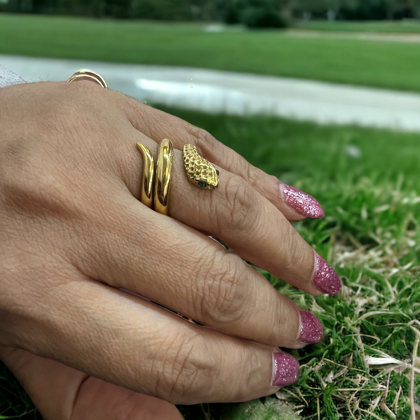 Serpentine Allure: Gold Snake Ring for Women with Captivating Green Eyes - Elevate Your Style with this Daring and Fashionable Statement Piece