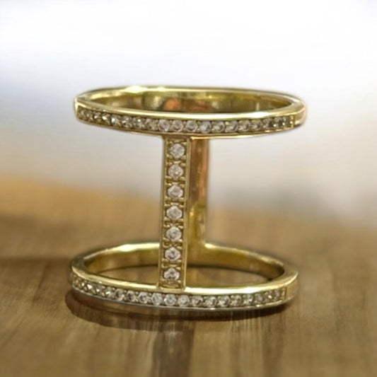 two stacked gold plated rings