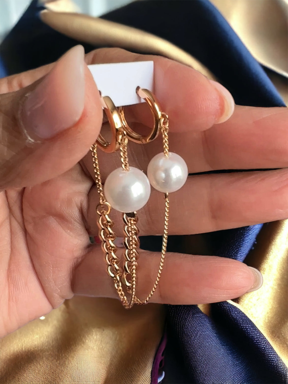 Pearl drop earrings 
Pearl and chain dangling earrings 
