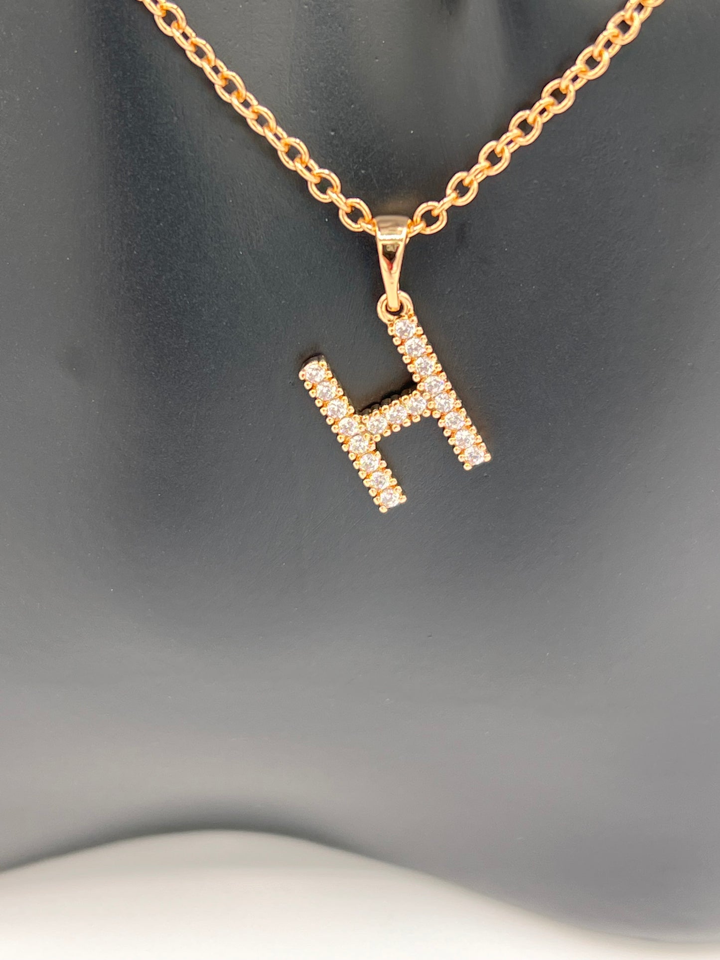 40cm linked gold plated chain with Capital letter T  the letter H is embellished with 3 A cubic zircons