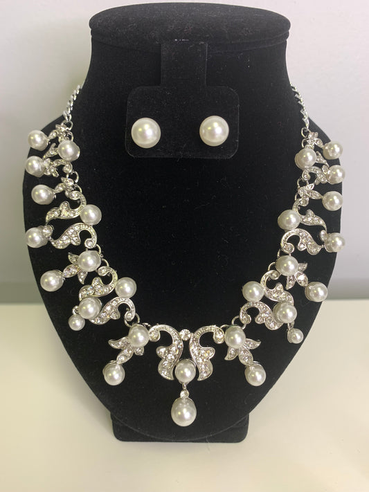 Faux Pearl Rhodium Plated Bib Style Necklace And Stud Earrings