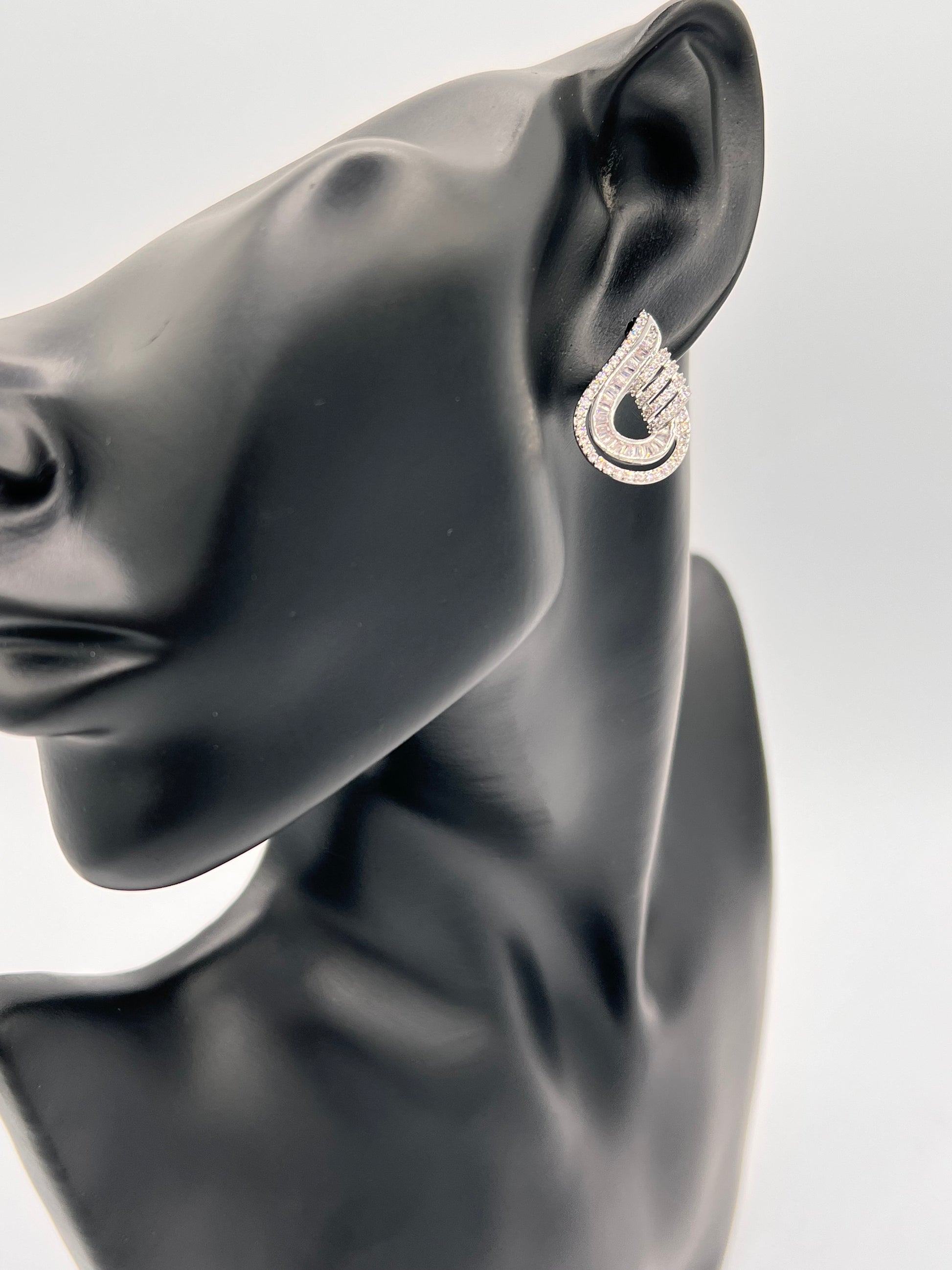 beautiful double tear loops design silver earring studs for women. trend setter non tarnish ewelry