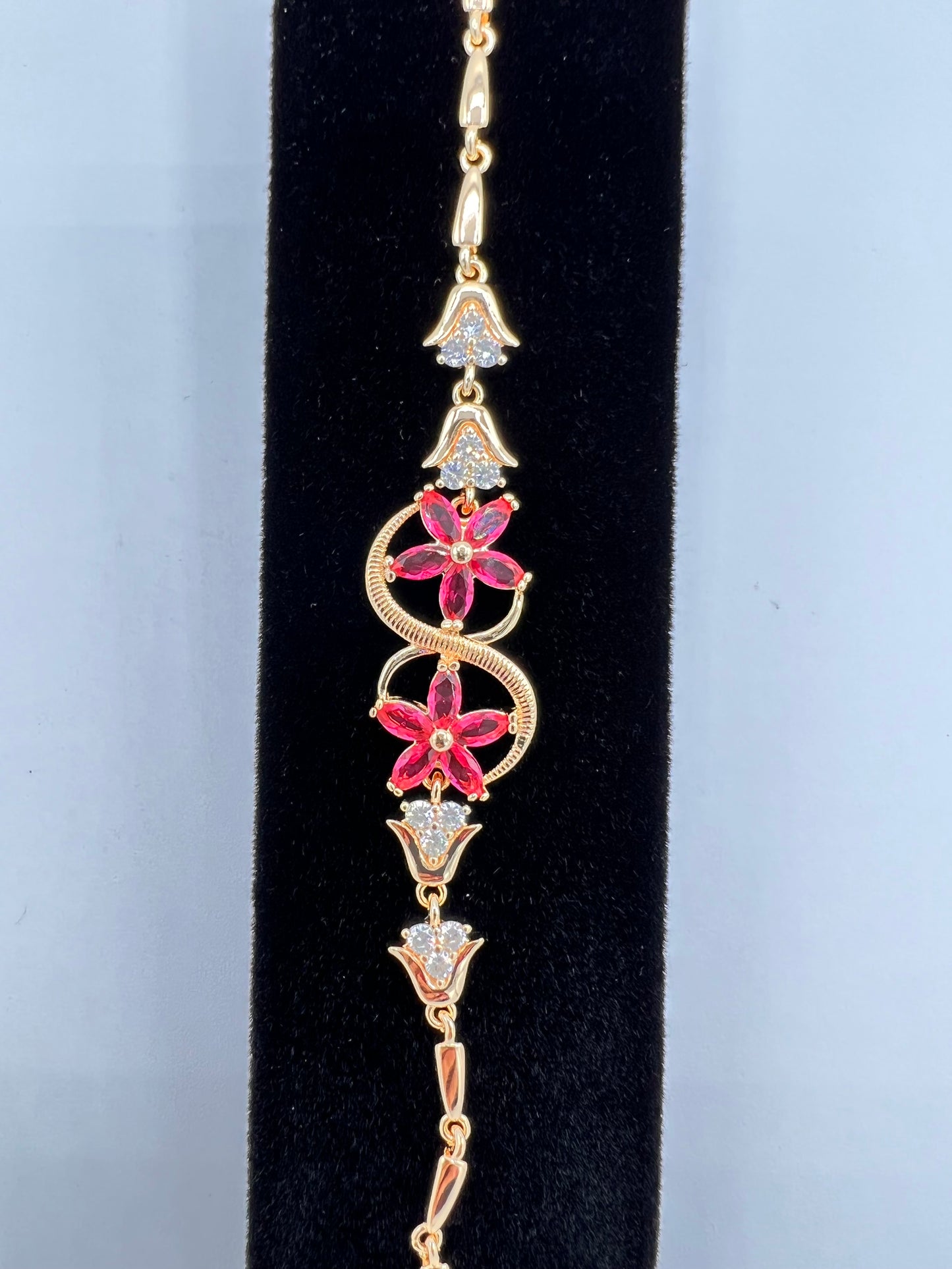 Semi Infinity Design Pink And White Stone Bracelet