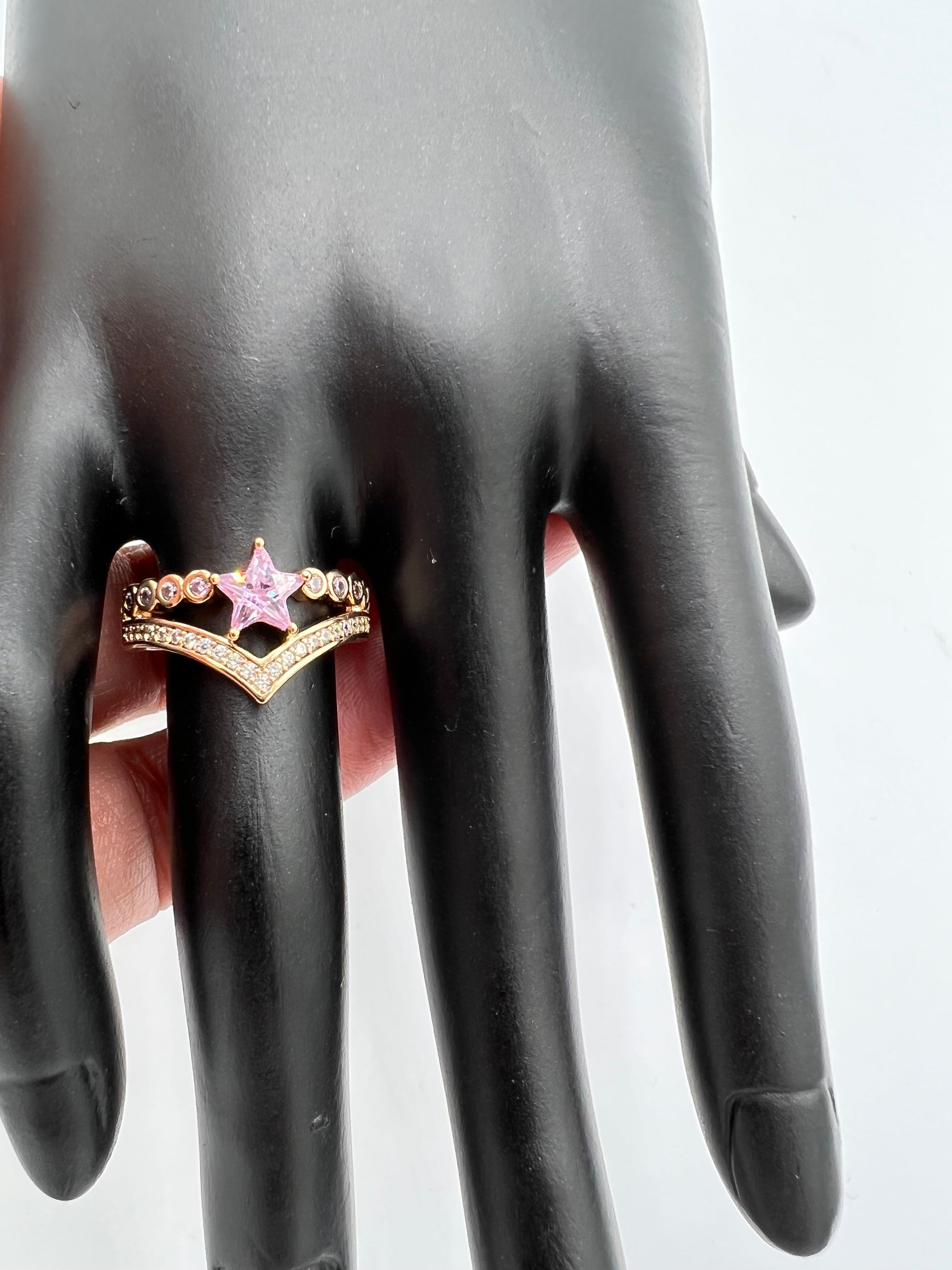 double band gold plated ring the main stone is pink color star shape cubic zircon. rest of the bands are embellished with white zircons come visit us at the national women show Toronto Ladies day out