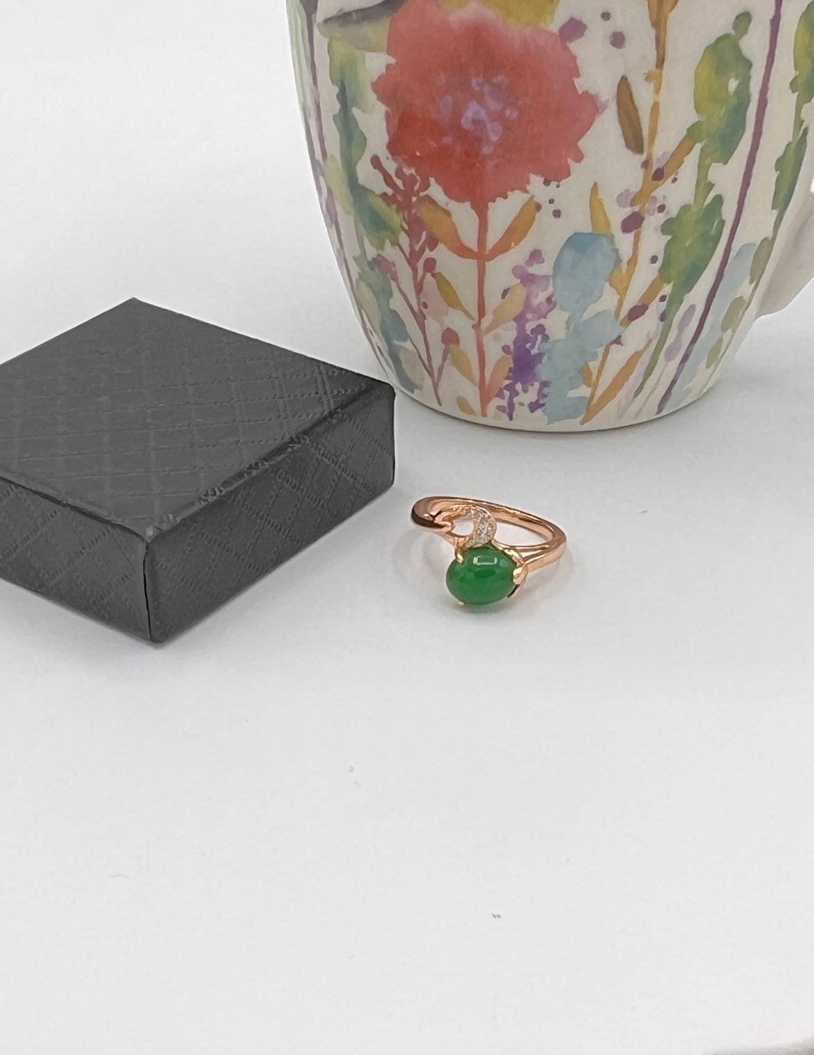 gold design emerald and white stone