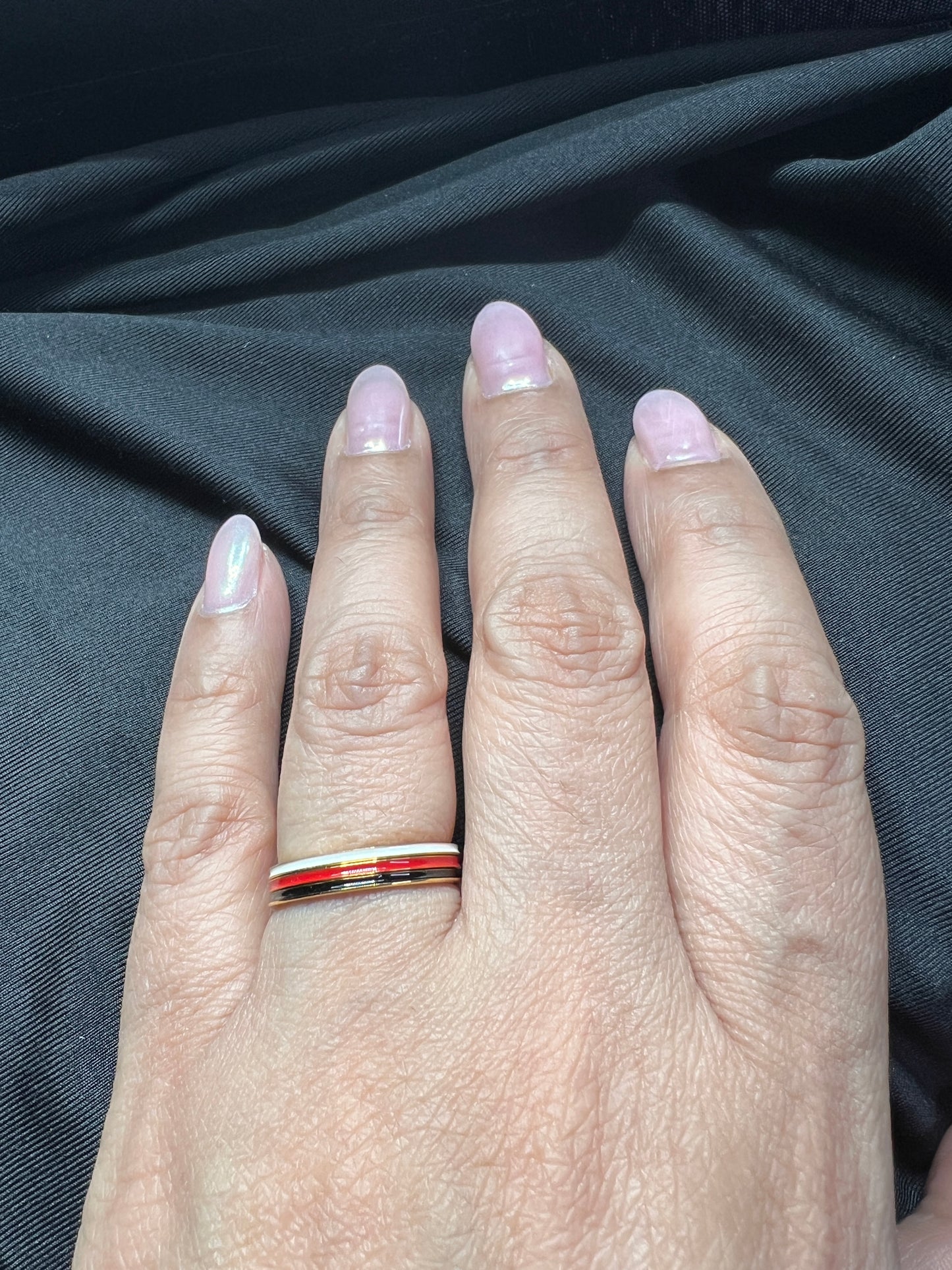 white black and red stacking rings
