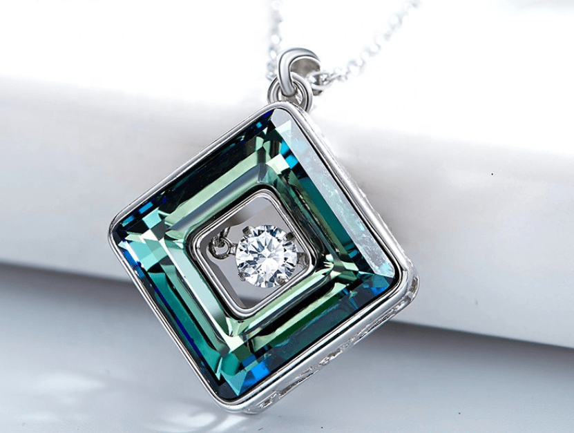 see green and see blue crystal necklace with dancing stone in the middle